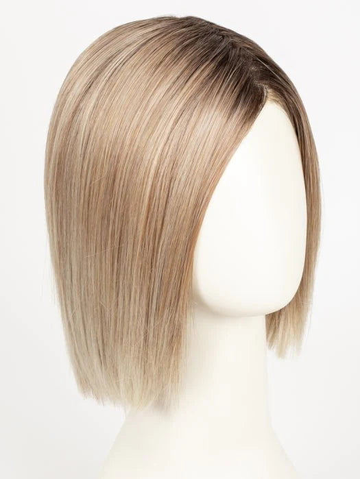Mannequin wearing a short brown bob wig for women with straight sleek cut and subtle dark roots
