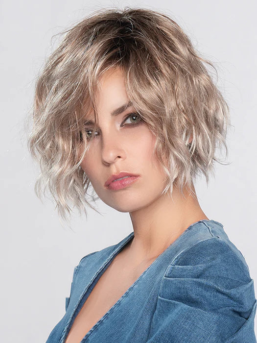 Ellen Wille Dance wig in a wavy bob style with sandy blonde highlights for a trendy look